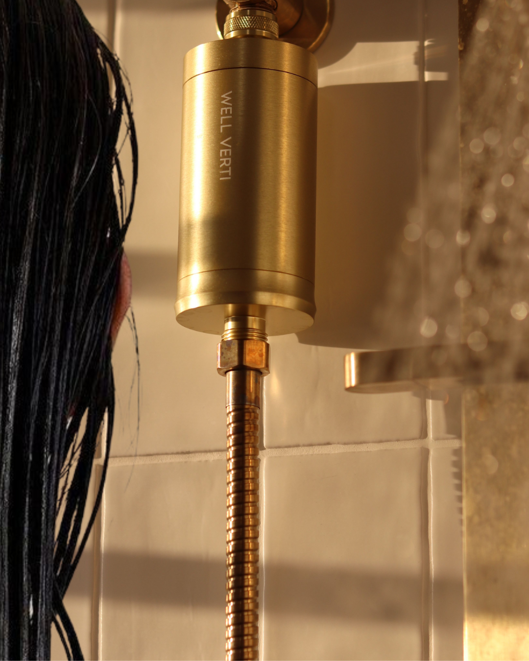 Stunning Well Verti™ Brushed Gold Shower Filter – A luxury wellness upgrade, removing chlorine, PFAS, and impurities for glowing skin, healthier hair, and a spa-like shower experience.